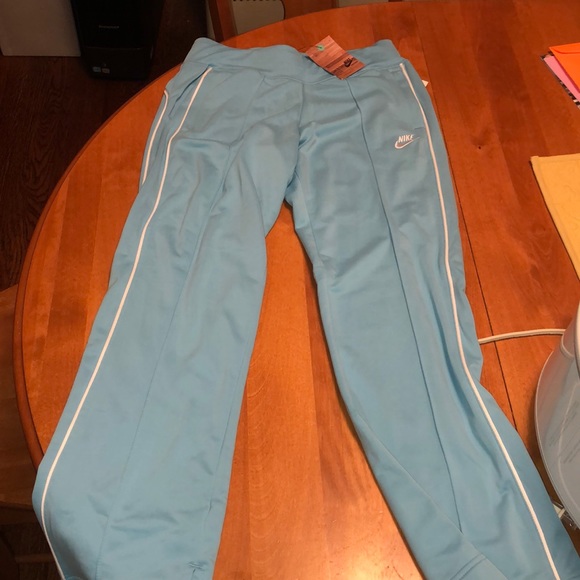 light blue nike track pants